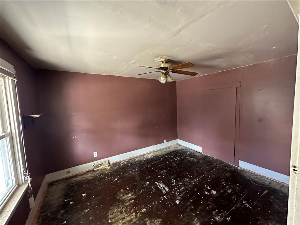 1616 3rd Avenue Arnold, PA 15068 - Photo 9 of 18 en empty room with a fan