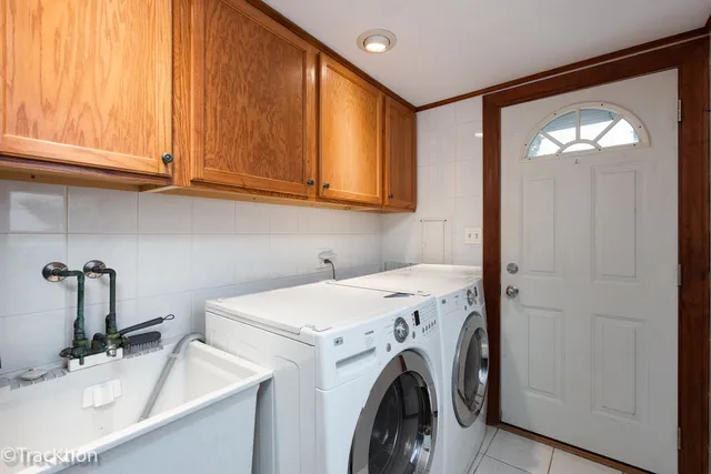 a utility room with dryer and washer