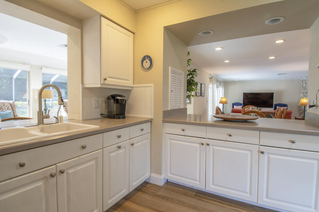 3372 Southeast Court Drive Stuart, FL 34997 - Photo 28 of 33 a spacious bathroom with double sink and a mirror
