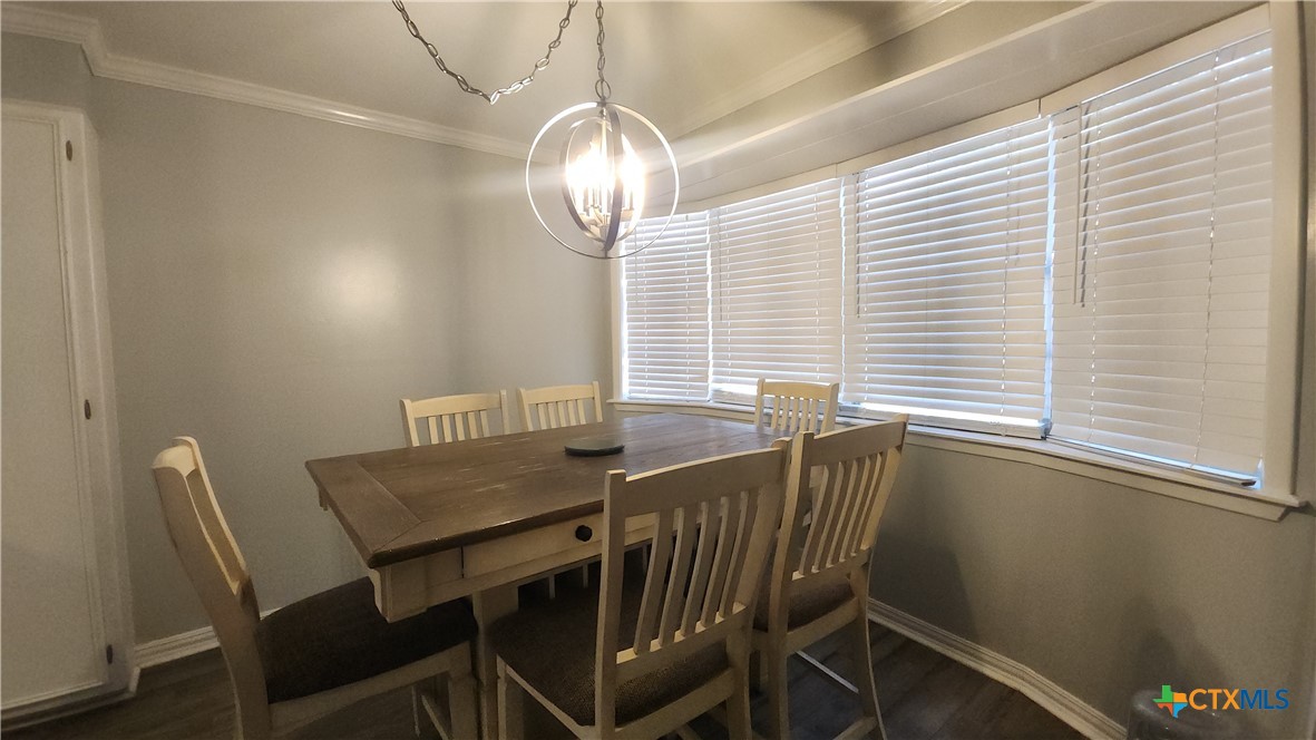 204 Cherokee Lane Victoria, TX 77901 - Photo 7 of 14 a view of a dining room with furniture and window