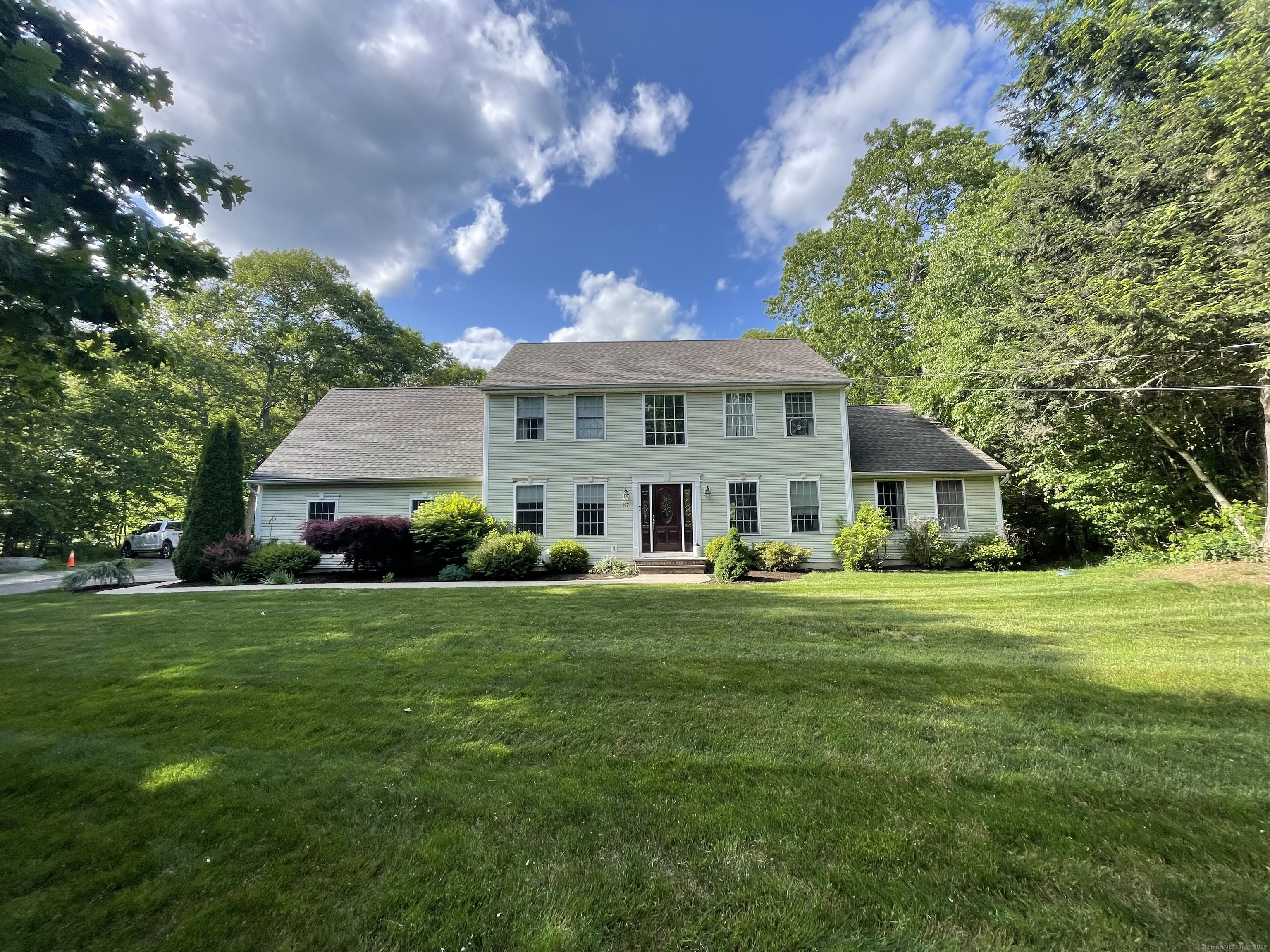 167 County Road Somers, CT 06071 - Photo 1 of 1 a front view of a house with a garden
