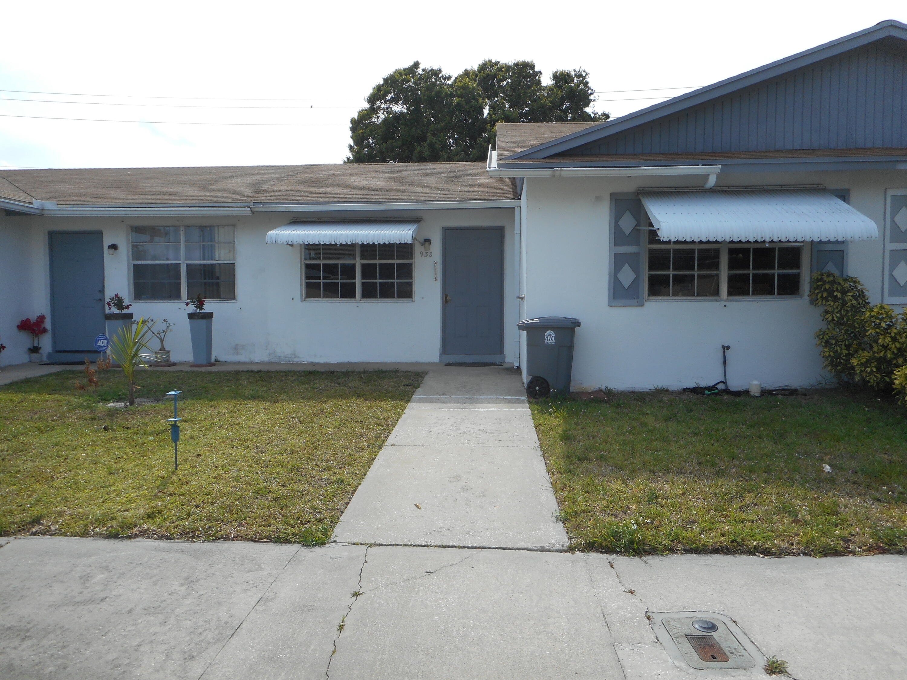 938 Sumter Road West West Palm Beach, FL 33415 - Photo 1 of 14 Front
