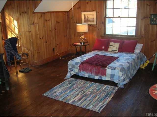 127 Brooks Avenue Raleigh, NC 27607 - Photo 10 of 11 Cozy and private attic retreat has one finished room plus identical unfinished room and 1/2 bath! All original hardwood flooring and pine paneling.