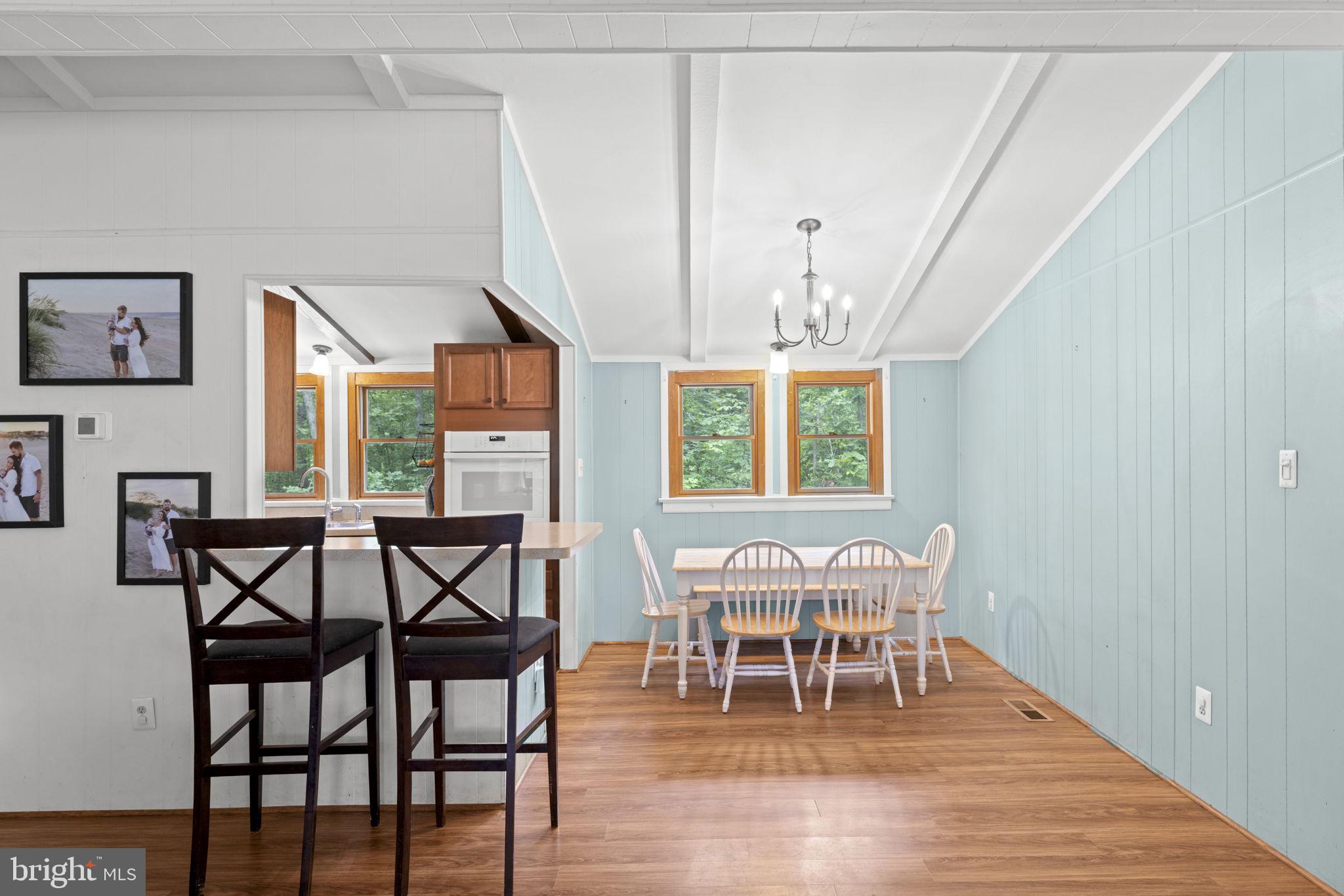 9448 Green Road Midland, VA 22728 - Photo 28 of 91 a view of a dining room with furniture and wooden floor