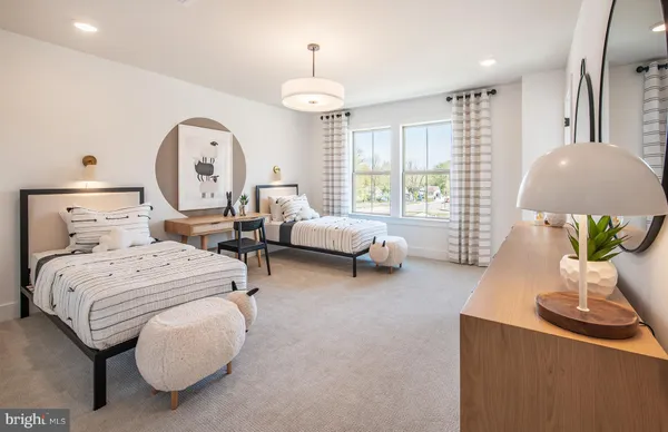 a bed room with a bed and a chandelier