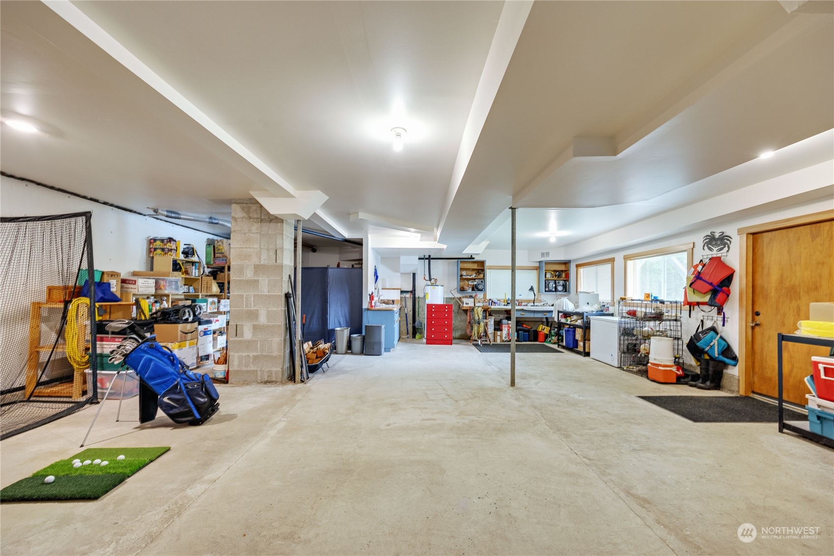 1511 Griffith Point Road Nordland, WA 98358 - Photo 29 of 40 a view of a garage with a bike and car