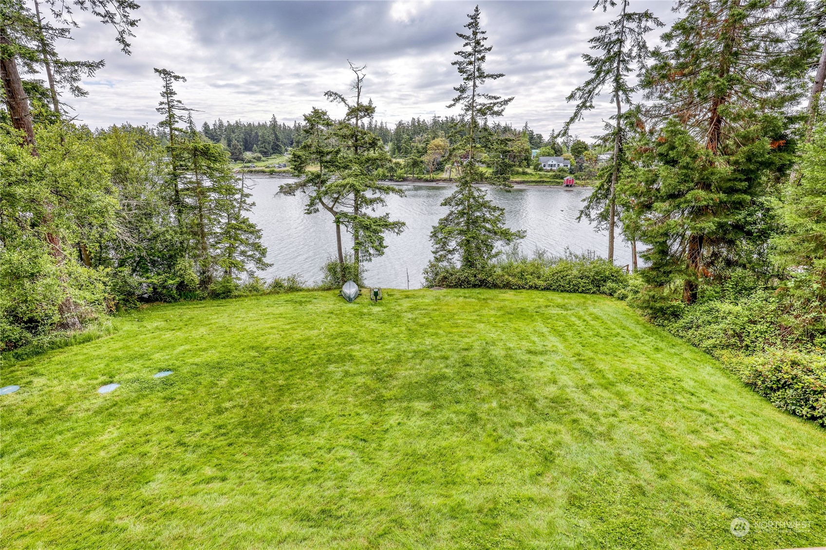 1511 Griffith Point Road Nordland, WA 98358 - Photo 33 of 40 a view of a lake from a yard