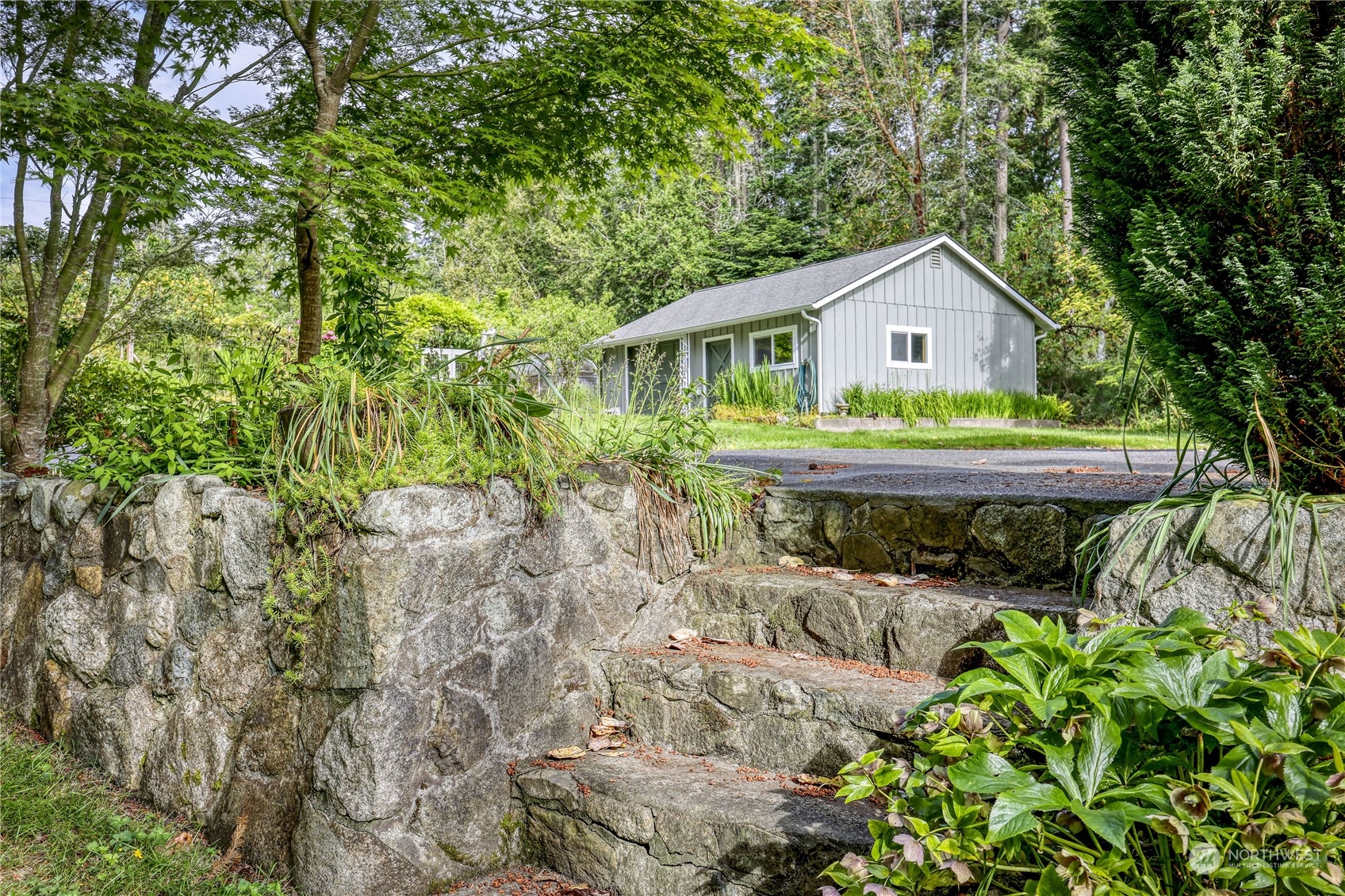 1511 Griffith Point Road Nordland, WA 98358 - Photo 34 of 40 a front view of house with yard and green space