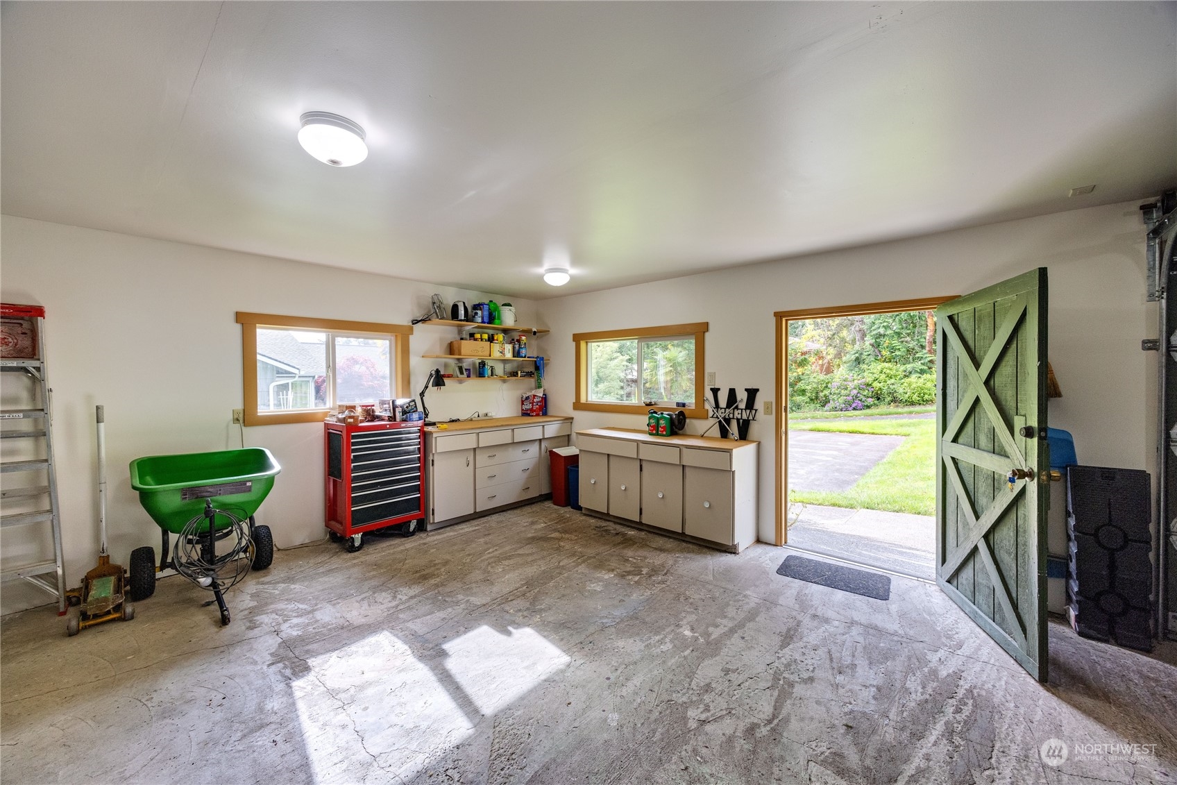 1511 Griffith Point Road Nordland, WA 98358 - Photo 37 of 40 a kitchen with a sink and a large window
