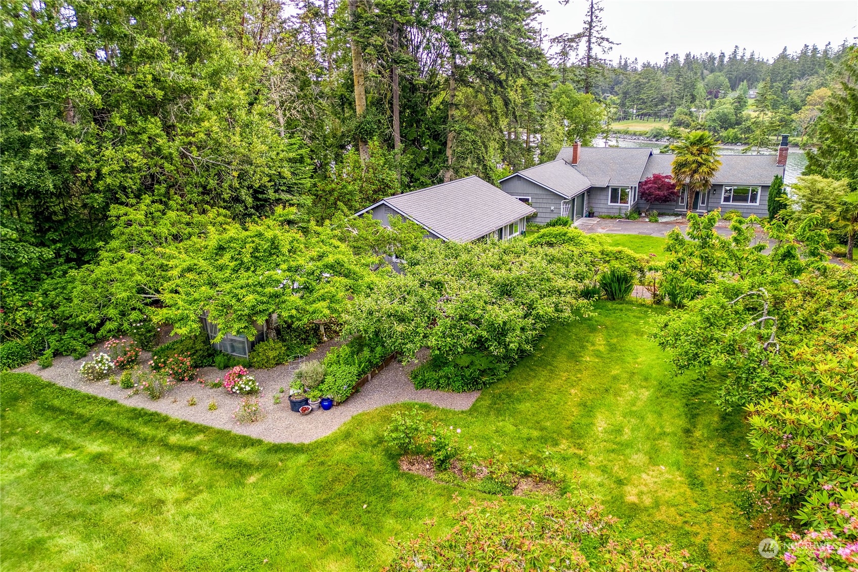 1511 Griffith Point Road Nordland, WA 98358 - Photo 38 of 40 a view of a backyard with sitting area