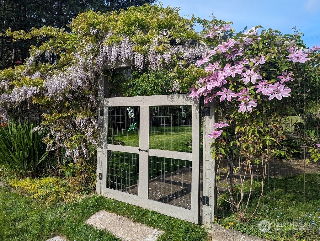 1511 Griffith Point Road Nordland, WA 98358 - Photo 39 of 40 a house view with a garden space