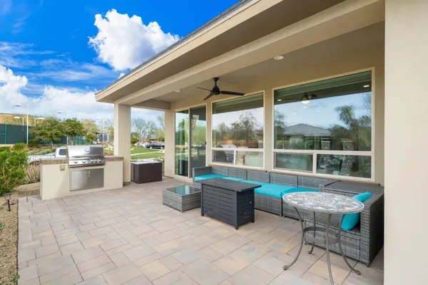 a view of a patio with swimming pool