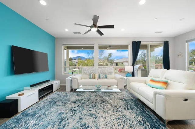 a view of a dining room with furniture window and outside view