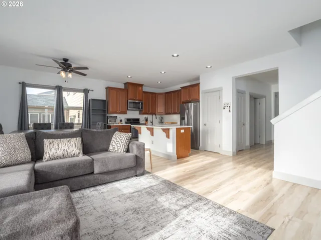 a bedroom with a bed and a television