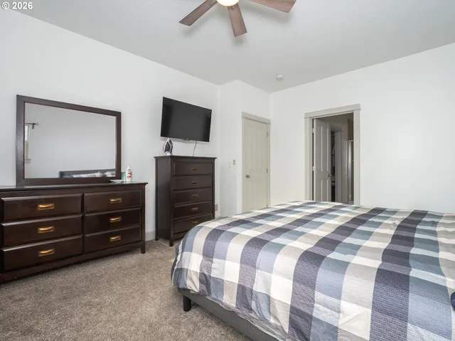 a bathroom with a tub and a shower