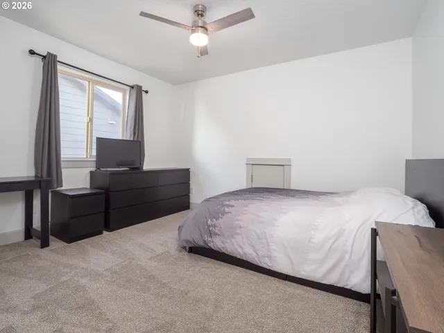 a room with furniture and a window