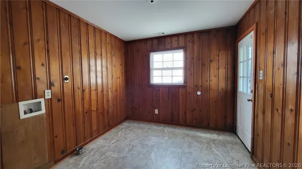 wooden floor and windows in an entryway