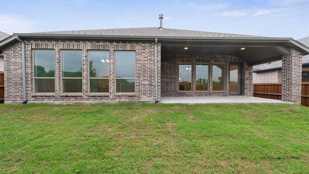 829 Stoney Bridge Way Lavon, TX 75166 - Photo 21 of 35 a view of house with yard