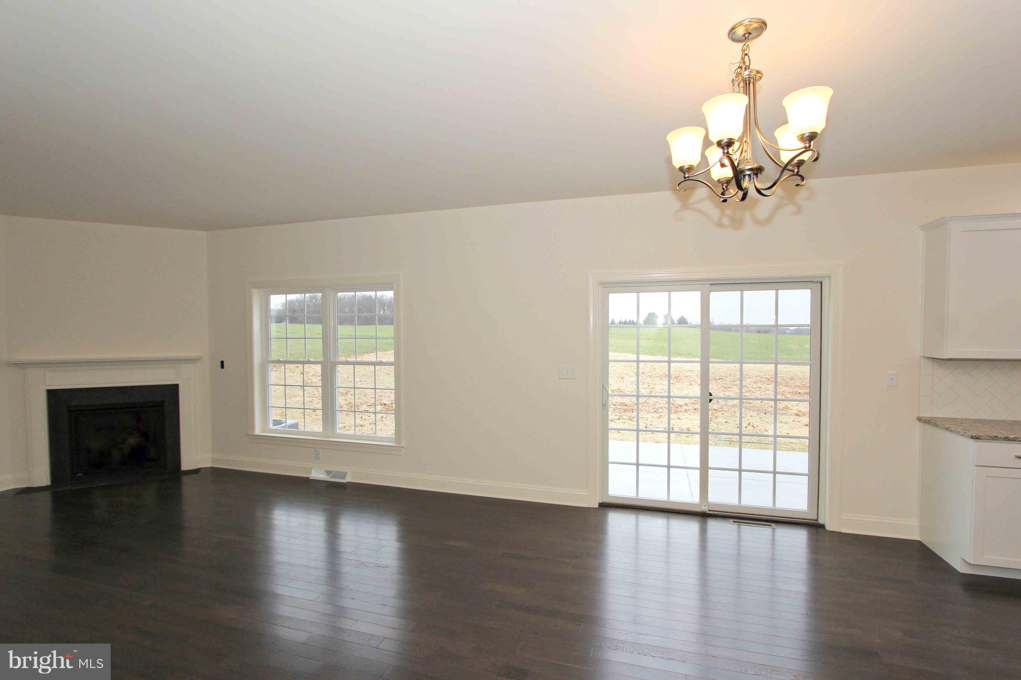 2455 Baker Road York, PA 17408 - Photo 14 of 54 Family Room w/Gas Fpl open to Kit and patio