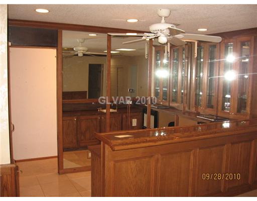 1455 Westwind Road Las Vegas, NV 89146 - Photo 14 of 25 Other. Bar and Basement entrance