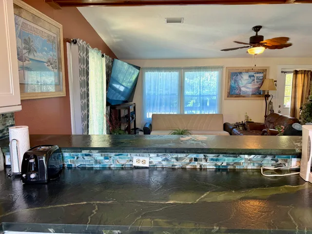 a view of a living room with furniture