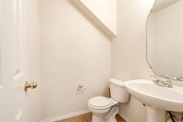 a bathroom with a sink and a toilet