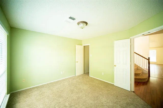 a view of a room with a window