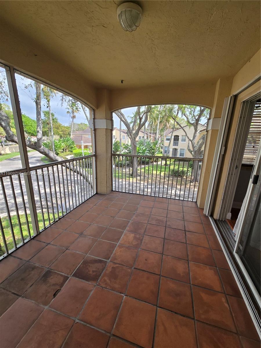 14611 Balgowan Road, Unit 2041 Miami Lakes, FL 33016 - Photo 20 of 22 a view of a balcony