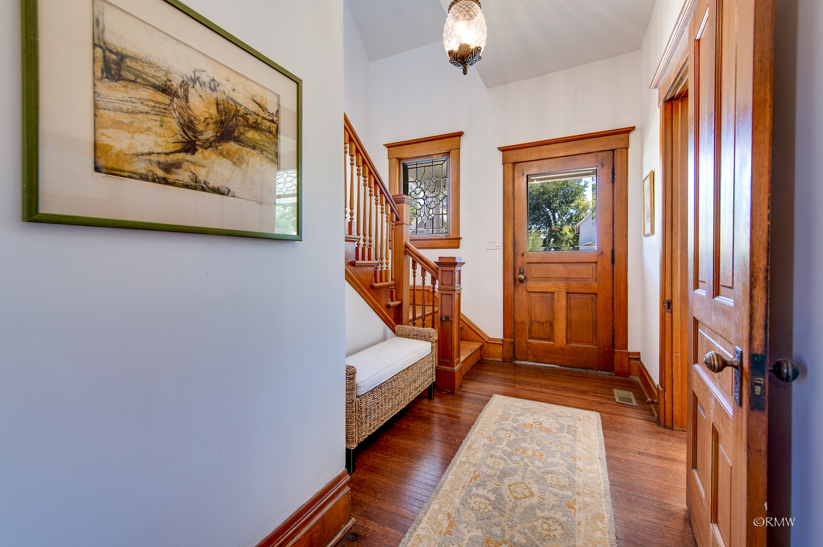 414 North Spring Street Elgin, IL 60120 - Photo 8 of 51 a view of an entryway with wooden floor