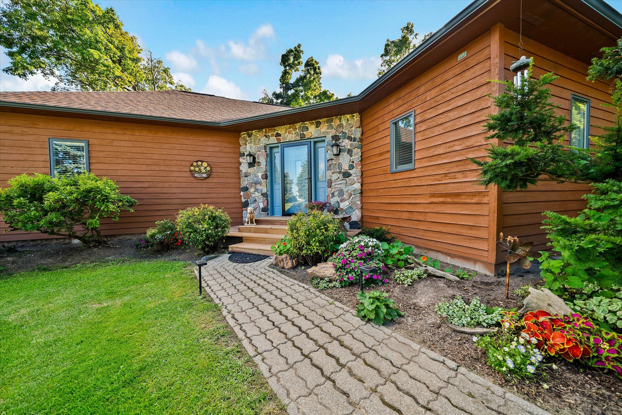 9338 Sauk Trail Road Wilson, WI 53070 - Photo 47 of 52 02-Front Entrance