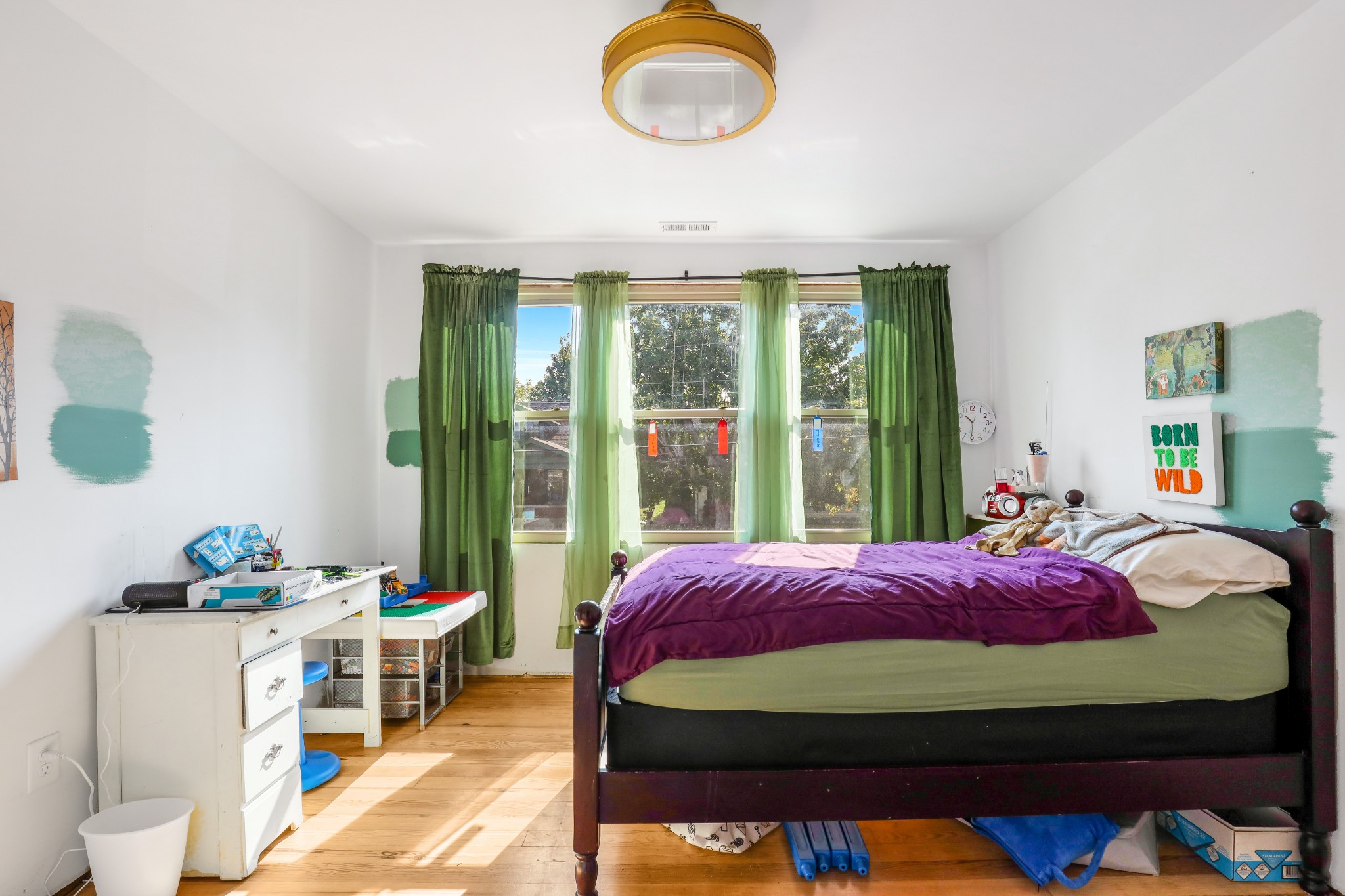307 North Walnut Street Springfield, TN 37172 - Photo 18 of 23 a bedroom with a bed and large windows