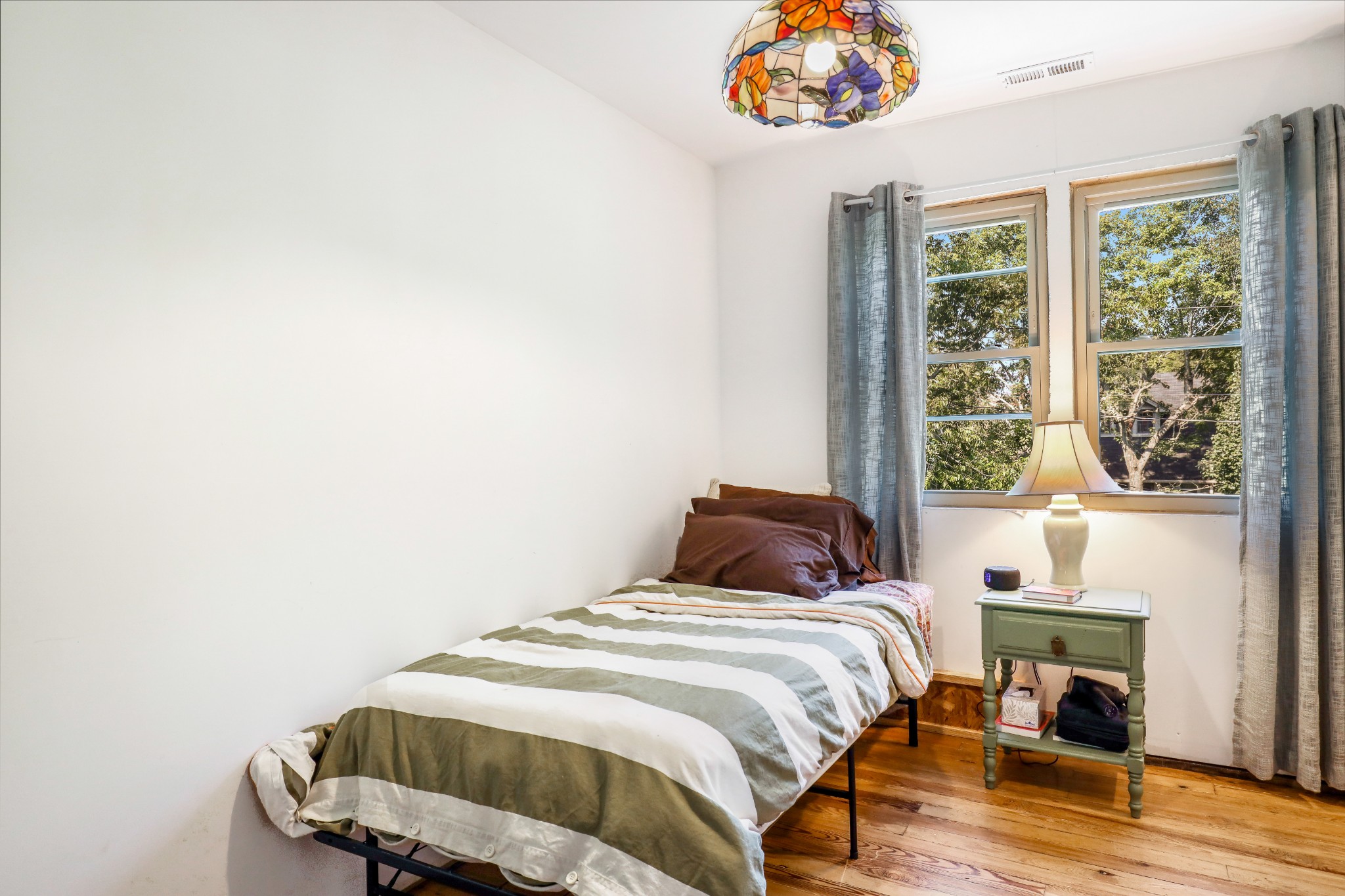 307 North Walnut Street Springfield, TN 37172 - Photo 20 of 23 a bedroom with a bed and a window