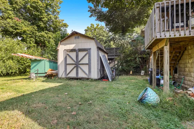 a view of backyard with green space