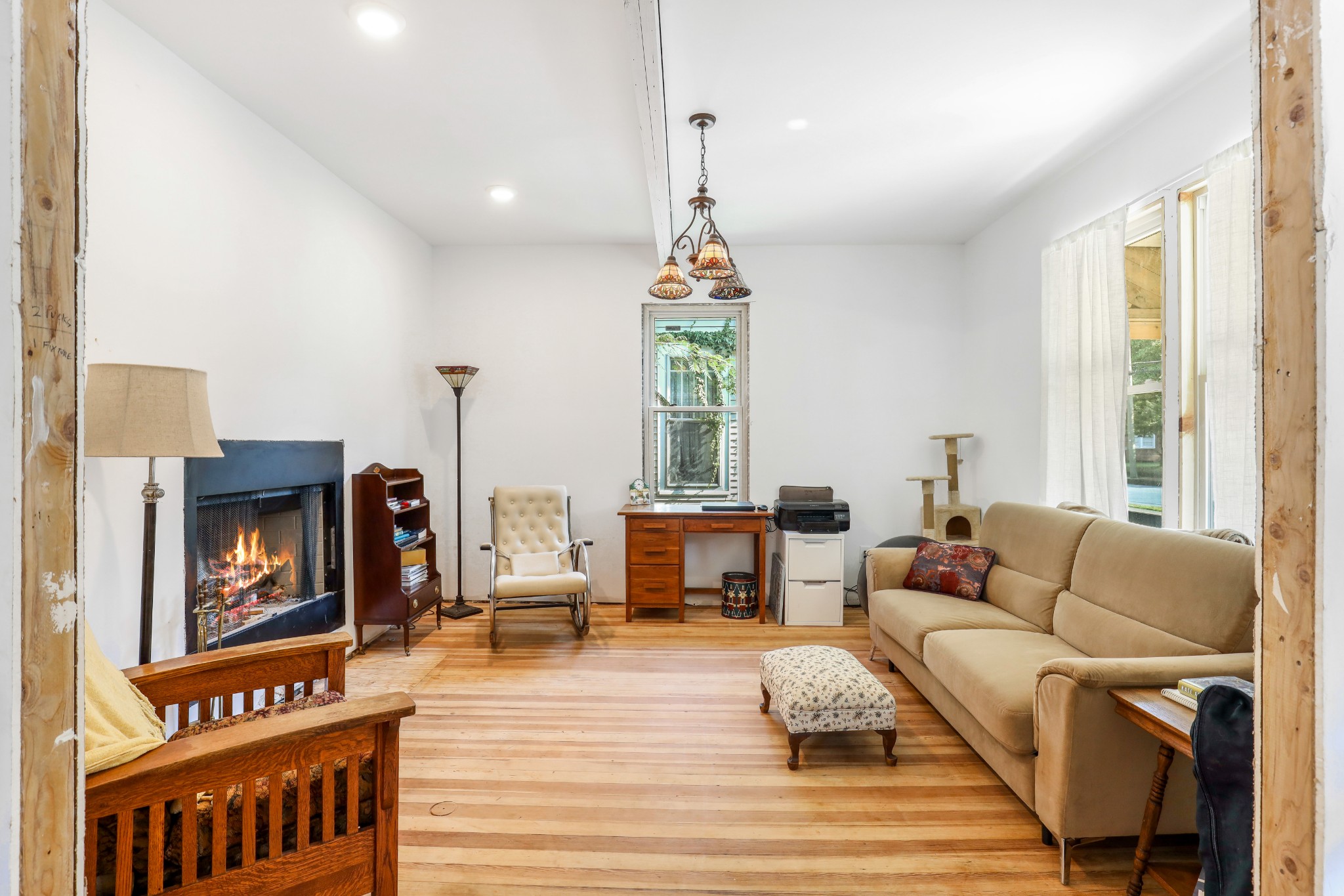 307 North Walnut Street Springfield, TN 37172 - Photo 10 of 23 a living room with furniture a window and a fireplace