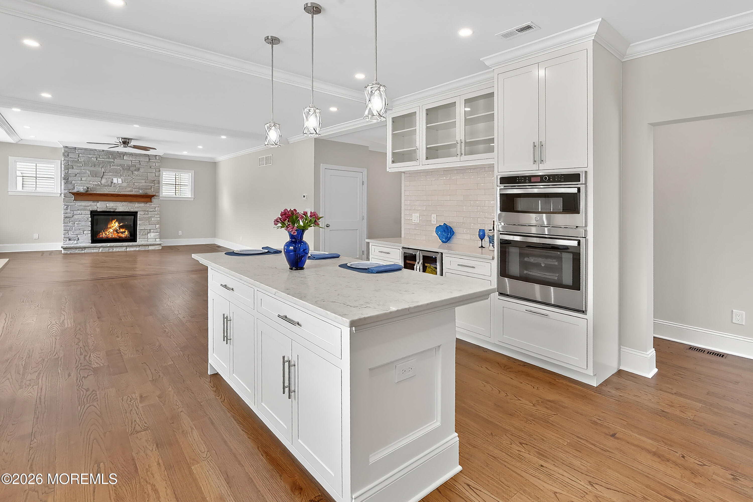 909 Jersey Avenue Spring Lake Heights, NJ 07762 - Photo 54 of 57 a kitchen with stainless steel appliances a stove top oven a sink a refrigerator and a window