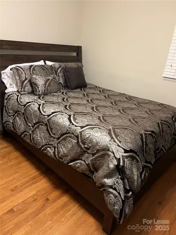 a bedroom with a bed
