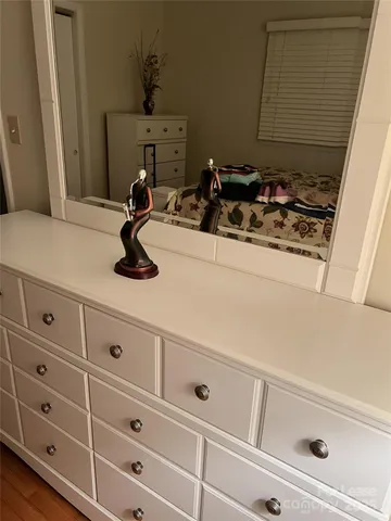 a bathroom with a sink and cabinets