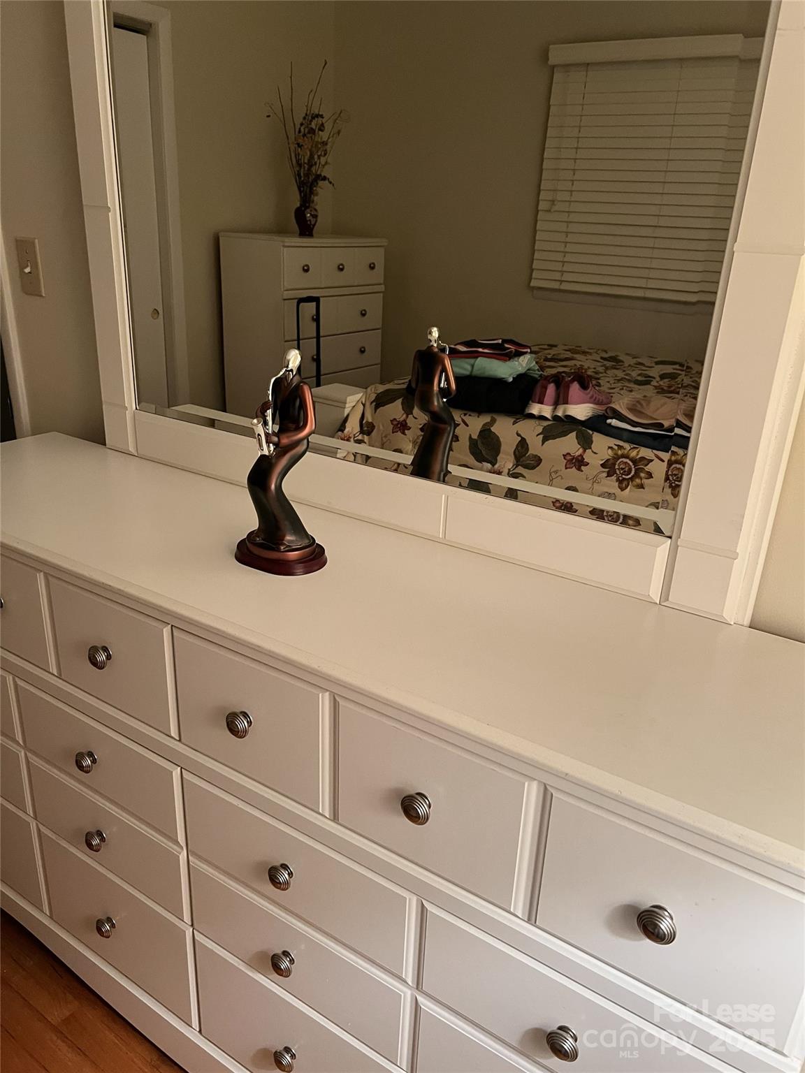 179 Rutledge Road Fletcher, NC 28732 - Photo 17 of 28 a bathroom with a sink and cabinets