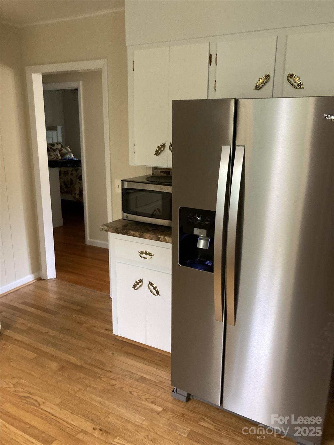 179 Rutledge Road Fletcher, NC 28732 - Photo 24 of 28 a kitchen with stainless steel appliances a refrigerator and a stove