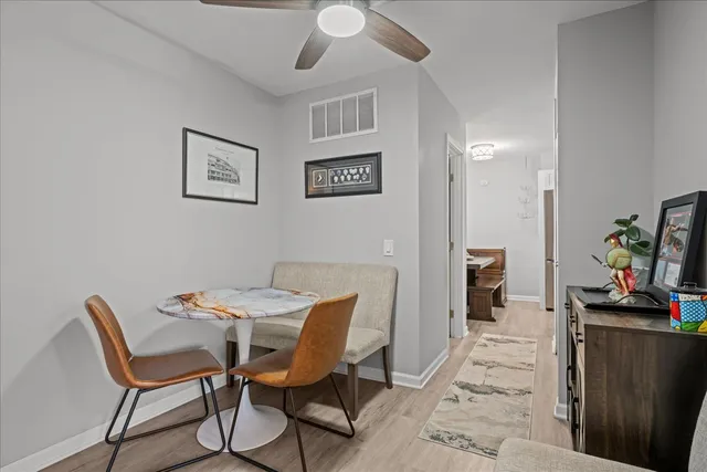 a view of a dining room with furniture