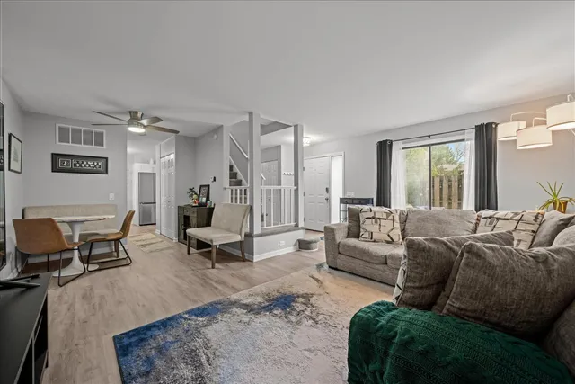 a living room with furniture and a couch