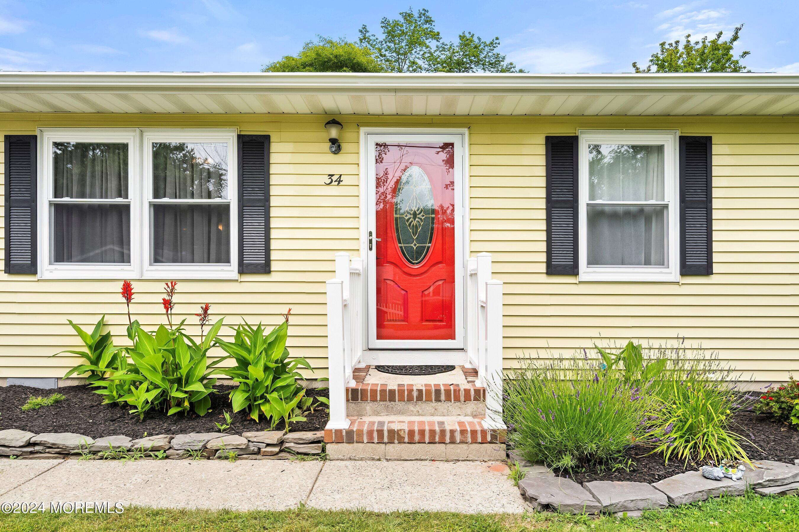 34 Maple Street Waretown, NJ 08758 - Photo 6 of 36 a front view of a house