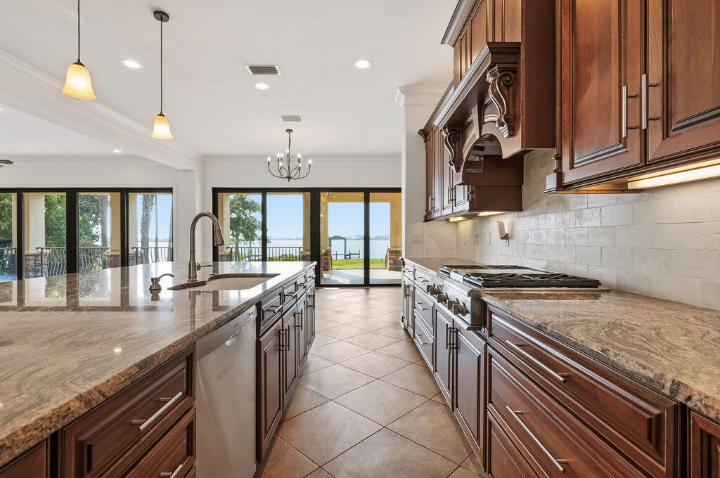 18 Kimbrough Road Mary Esther, FL 32569 - Photo 20 of 89 a kitchen with stainless steel appliances granite countertop a stove and a sink