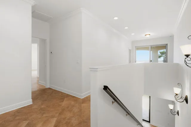 a view of a livingroom with furniture and front door