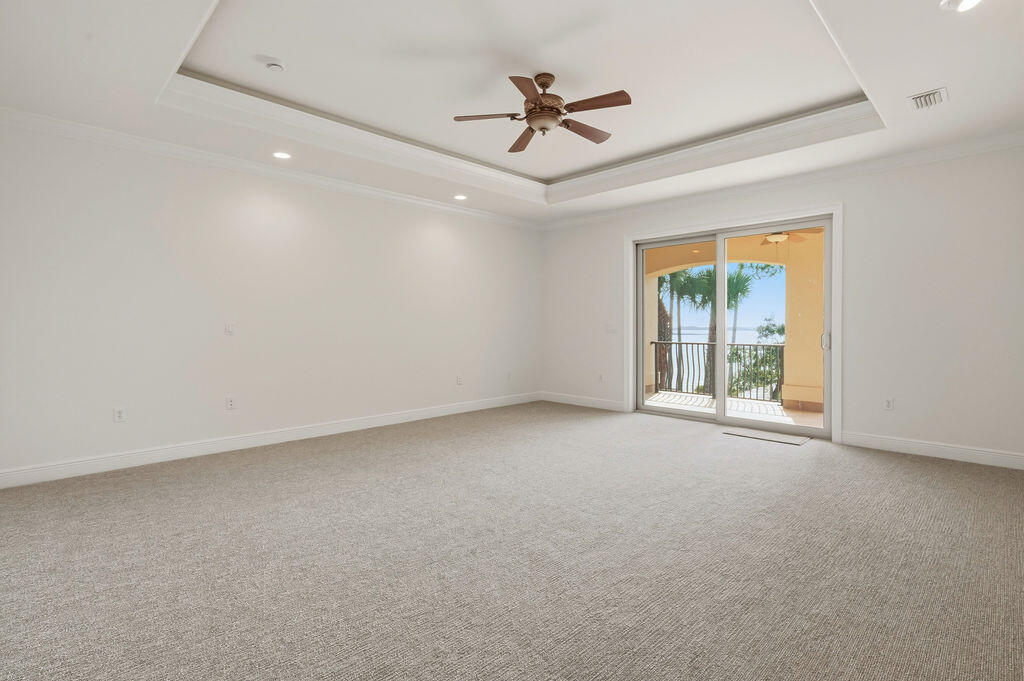 18 Kimbrough Road Mary Esther, FL 32569 - Photo 30 of 89 an empty room with a ceiling fan and windows