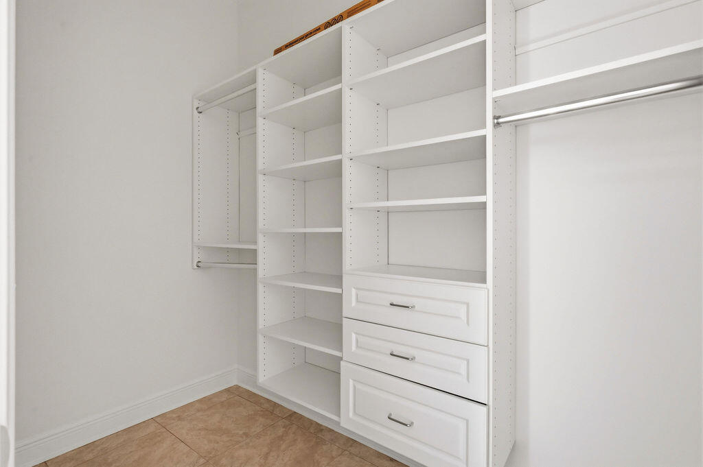 18 Kimbrough Road Mary Esther, FL 32569 - Photo 58 of 89 a view of walk in closet with empty racks