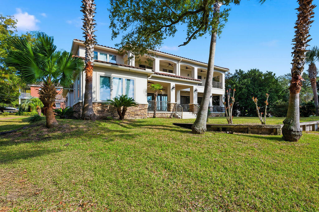 18 Kimbrough Road Mary Esther, FL 32569 - Photo 72 of 96 a front view of a house with garden