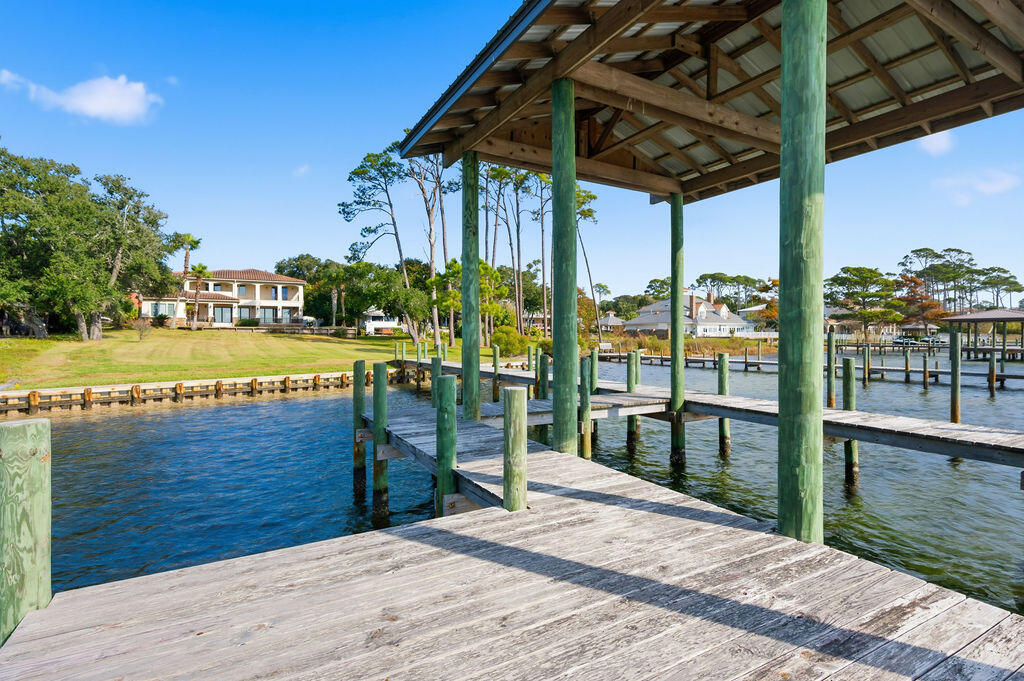 18 Kimbrough Road Mary Esther, FL 32569 - Photo 73 of 89 a view of a swimming pool with a patio