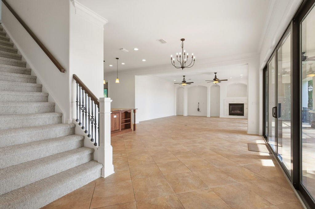18 Kimbrough Road Mary Esther, FL 32569 - Photo 10 of 89 a view of a hallway with wooden floor and staircase