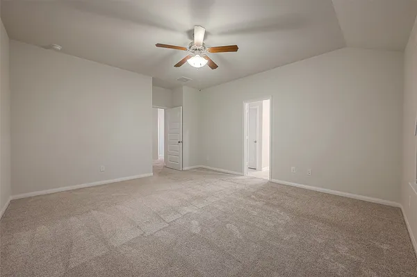 a bathroom with a bathtub shower sink mirror and a bathtub